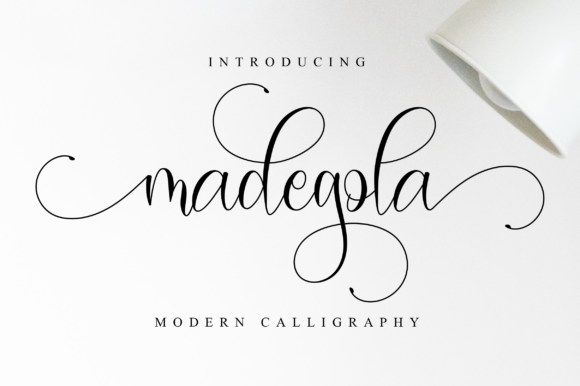 Madegola Script Font