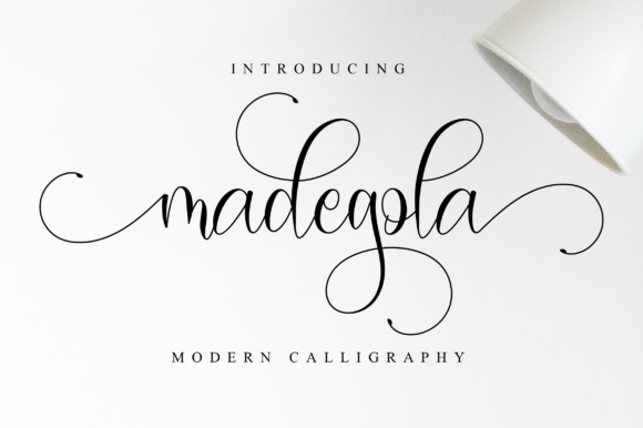 Madegola Script Font Poster 1