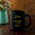 Black Coffee Mug Rustic Mockup with Wildflowers in Mint Green Vase
