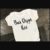 White Baby Bodysuit Mockup Photo