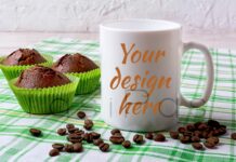 White Mug Mockup with Chocolate Muffins on Green Checkered Napkin Poster 1